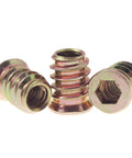 Close-up view of 50 Pack Quarter Inch By Twenty Threaded Wood Inserts For Furniture And DIY Projects, Screw In Nutserts With Hex Drive, 15mm Length