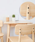 Wooden chairs and table set with close-up of black screw heads covered by 200Pcs 8 Color Hinged Screw Cap Covers Kit With Storage Box Plastic Shutter Caps 13.5mm Flip Top Caps For Screw Heads On Furniture And Fence Decorative Protection And Finishing Touch.