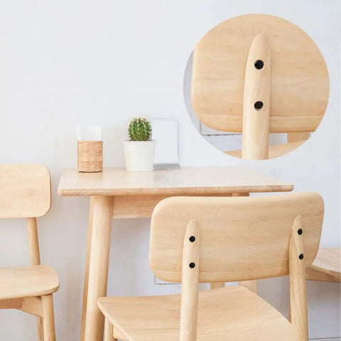 Wooden chairs and table set with close-up of black screw heads covered by 200Pcs 8 Color Hinged Screw Cap Covers Kit With Storage Box Plastic Shutter Caps 13.5mm Flip Top Caps For Screw Heads On Furniture And Fence Decorative Protection And Finishing Touch.