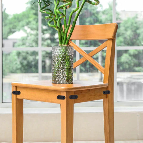 Flat Straight Brace brackets installed on a wooden chair for repair, showcasing stainless steel flat plate straight brackets with screws.