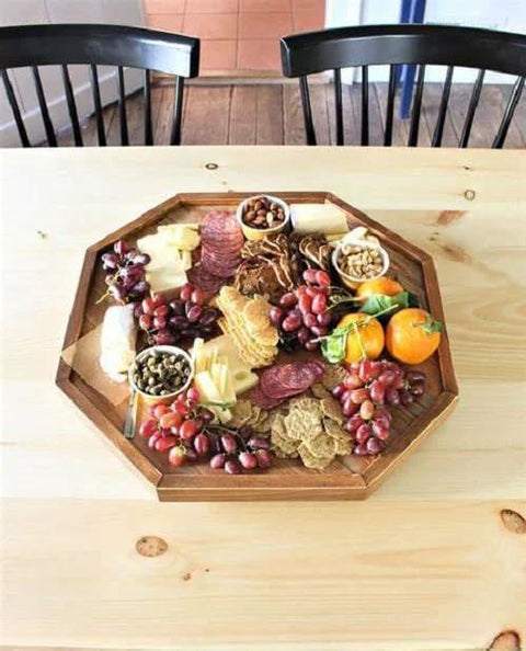 Charcuterie board with meats, cheeses, nuts, and fruits on a 12-inch Lazy Susan Base Only For Glass Granite Or Wood Tables Heavy Duty Aluminium Alloy Rotating Turntable.