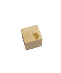 Wooden block with carved hole viewed from above on white background