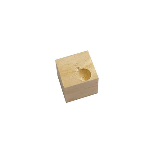 Wooden block with carved hole viewed from above on white background
