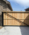 Installed wooden gate with Heavy Duty 5 Inch Weld On Gate Hinges 2 Pack Black Iron Barrel Hinges 450 lb Capacity for metal fences