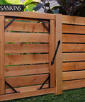 Beefy 14 Inch Gate Spring Self Closing Heavy Duty Outdoor Gate Spring With Adjustable Tension installed on wooden gate