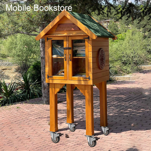 Wooden mobile bookstore on four 2 inch side mount caster wheels for outdoor use, books visible behind glass doors.