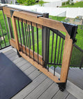 Sliding Gate Hardware Kit installed on wooden deck, featured in outdoor setting. Heavy Duty Slide Gate Kit with latch visible.