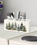 Christmas Tree Wooden Utensils Holder with forest landscape and reindeer, 3-compartments, on white countertop with utensils inside.