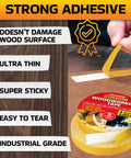 Image of Pro Grade Heavy Duty Double Sided Woodworking Tape 3 Pack 1 Inch By 120 Feet Super Strong Adhesion being applied on wood surface.