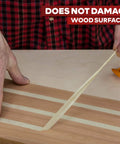 Double Sided Woodworking Tape With Yellow Backing, Industrial Grade Adhesive shown in use on wood surface
