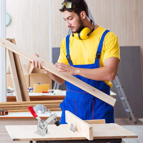 Adjustable Toggle Clamp Set 12 Pack Quick Release Hold Down Clamps 201 B Style with Anti Slip Red Finish on woodworking table.