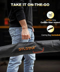 Person carrying All Purpose 360 Degree Rechargeable Work Light With Remote Telescopic Stand in lightweight carbon fiber material bag.