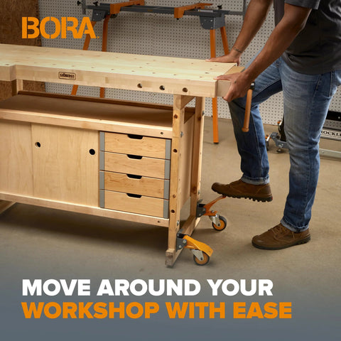 Person installing Heavy Duty Four Caster Workbench Mobility Kit With Locking Swivel Wheels And Metal Foot Brakes on a workbench