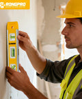 Person using 9 Inch Magnetic Torpedo Level With 45 Degree 90 Degree And 180 Degree Bubbles Magnetic Edge For Hands Free Use In Woodworking