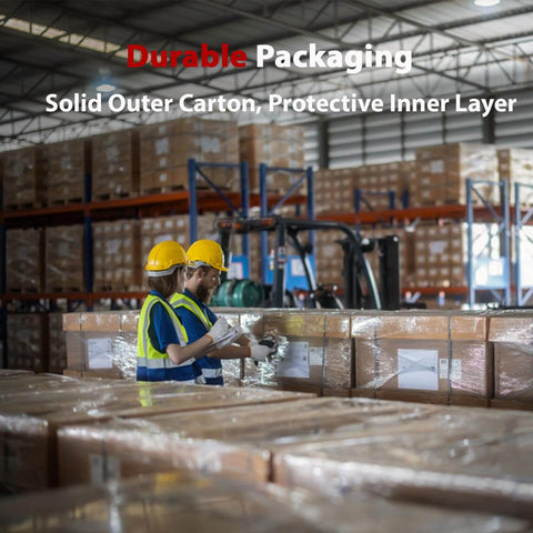 Warehouse workers in yellow vests and helmets checking stacked cardboard boxes, highlighting durable packaging with solid outer layers.