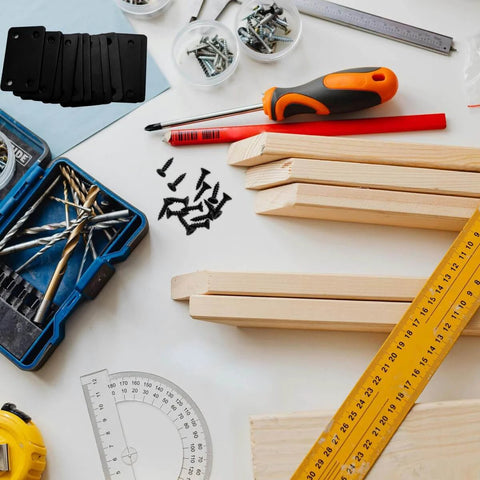 Workbench with tools and 12 Pcs Black Metal Flat Straight Brace Bracket, 2.4 x 1.5 Inch Joining Fixing Brackets, wooden planks.