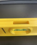 Close-up of Swanson Tool TL011, 9 Inch Speedlite Torpedo Level Yellow Built With High Impact Composite For Tough Jobsite Use Non Conductive Design.