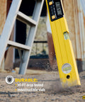 24 Inch Digital Level With LCD Readout And Audible Alerts For Precise Alignment In Construction Carpentry And DIY Projects Featuring A Heavy Duty Aluminum Frame in use outside.