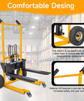 Foldable Hydraulic Material Lift Winch Stacker 450 Lbs Capacity With 35.8 Inch Max Lift And 9 Inch Wheels displayed in warehouse