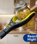 Two Pack Extra Long Grabber Reacher With Rotating Jaw holding jar of pasta on shelf, yellow mobility aid for decluttering.