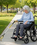 Woman in wheelchair using Two Pack Extra Long Grabber Reacher With Rotating Jaw 34 Inch Total Length And 32 Inch True Reach Mobility Aid