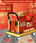 Hand truck with red gift boxes and decorations, 660 lbs capacity, showing different flooring types like concrete, carpet, wood, and tile.