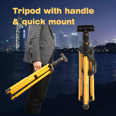 Person holding folded Beast Bright Dual Head LED Work Light With Tripod Stand against a city night backdrop