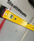 Yellow level on StealthMounts using universal level holder 2 pack