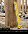 Stabila Type 96M Magnetic Level offers 96 inches of professional-grade accuracy, attached to wooden frame at construction site.
