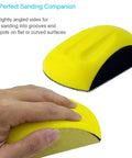 Hand holding yellow mouse-shaped 5-inch sanding block for hook-and-loop discs, ideal for precise sanding in grooves.