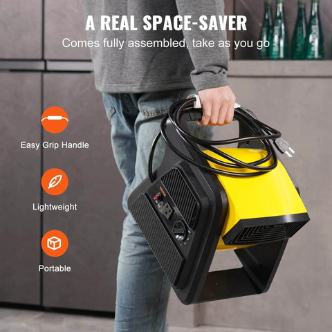 Person carrying Pivoting Utility Fan 600 CFM High Velocity Floor Blower For Drying Cooling Ventilation And Exhaust