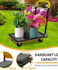 Yellow ✝️ Foldable Push Cart Platform Cart 330lbs Capacity with plants in a garden, showcasing durable steel and swivel wheels.
