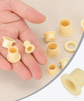 Hand holding Six Pcs Flanged Sleeve Bearings 8 mm Inner Diameter 10 mm Outer Diameter 10 mm Length POM Plastic Bushing Yellow