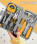 Bright yellow 20 Piece Basic Tool Kit with Mini Toolbox for home repairs, easy to use for beginners and gals, includes hammer, wrench, pliers.