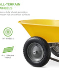 Close-up of 14-inch all-terrain wheel on yellow Dual Wheel Home Utility Yard Wheelbarrow Garden Cart with Built In Stand.