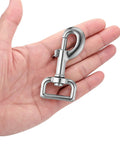 Swivel Eye Bolt Snap Hook in hand, part of a Set Of 4 Heavy Duty Dog Leash Clips, Zinc Alloy Nickel Plated Rust Resistant, 360 Degree Swivel