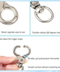 Close-up of 30 Pack Trigger Snap Hooks With Swivel Lobster Clasps Heavy Duty Zinc Alloy Lanyard Clips showing rotation and easy use features.