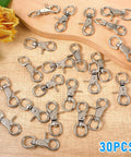 30 Pack Trigger Snap Hooks With Swivel Lobster Clasps Heavy Duty Zinc Alloy Lanyard Clips on wooden surface