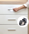 Front view of white cabinet with zinc alloy button lock; inset shows gunmetal press-release mechanism for wardrobe.