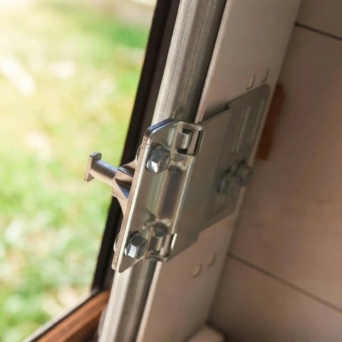 Carriage Bolts For Garage Door Tracks And Extension Ladders Set With Lock Nuts Zinc Plated installed on track close-up view