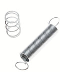 Close-up of metal springs from 200 Piece Compression and Extension Spring Kit With Plastic Storage Box, 20 Sizes of Small Metal Coil Springs for Auto, Appliances, Electronics, Medical Devices and DIY Fixes.