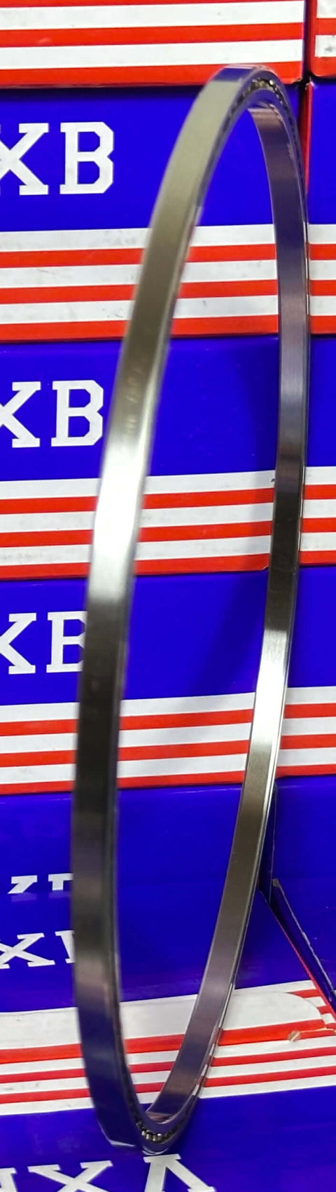 VA075CP0 Thin Section Bearing 7-1/2" x 8" x 1/4" inch displayed with a chrome steel finish and a side view.