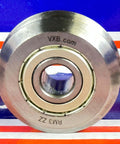 Stainless Steel RM3ZZ 12mm ID V-Rillenlager (W3ZZ) SSRM3ZZ Hochleistungsführungslager auf gestreiftem Hintergrund