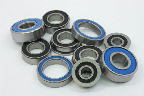 Miniature Bearings Demystified: Uses, Benefits & Specs - close-up of various miniature bearings with blue seals