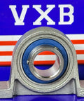 17mm Bore Miniature Stainless Steel Pillow Block Mounted Bearing in front of VXB logo background.