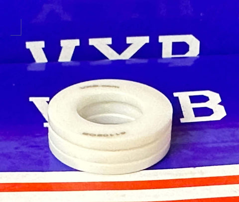 Full Ceramic 51102 ZrO2 Rodamiento de bolas Thrust  15x28x9mm sobre un fondo colorido.