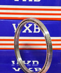 3" x 3-1/2" x 1/4" X-4-Point Contact Thin Section Bearing VA030XP0 side view on branded packaging.