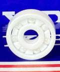 627 Full Ceramic ZrO2 Ball Bearing 7x22x7mm Miniature sur fond bleu avec accents blancs.