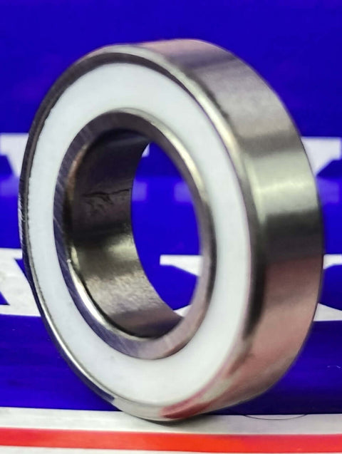 6902-2TS Bearing 15x28x7mm Sealed - PTFE seals close-up view, showcasing silver metal and white PTFE seal.