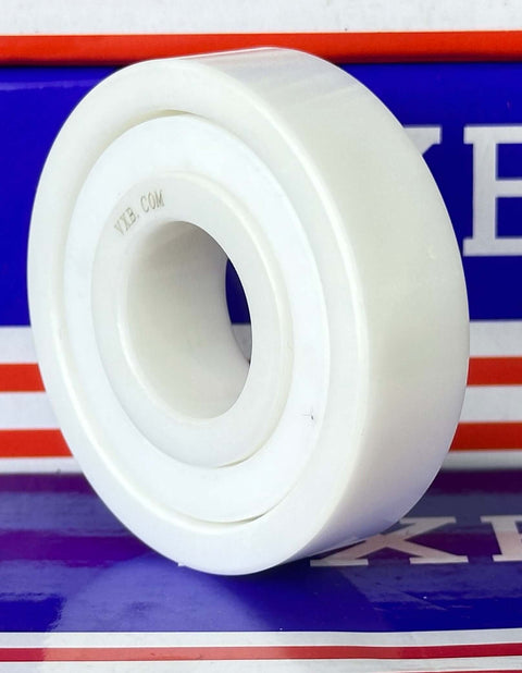 6304 ZrO2 Full Ceramic Ball Bearing displayed on a colorful background, showing its unique white ceramic design.
